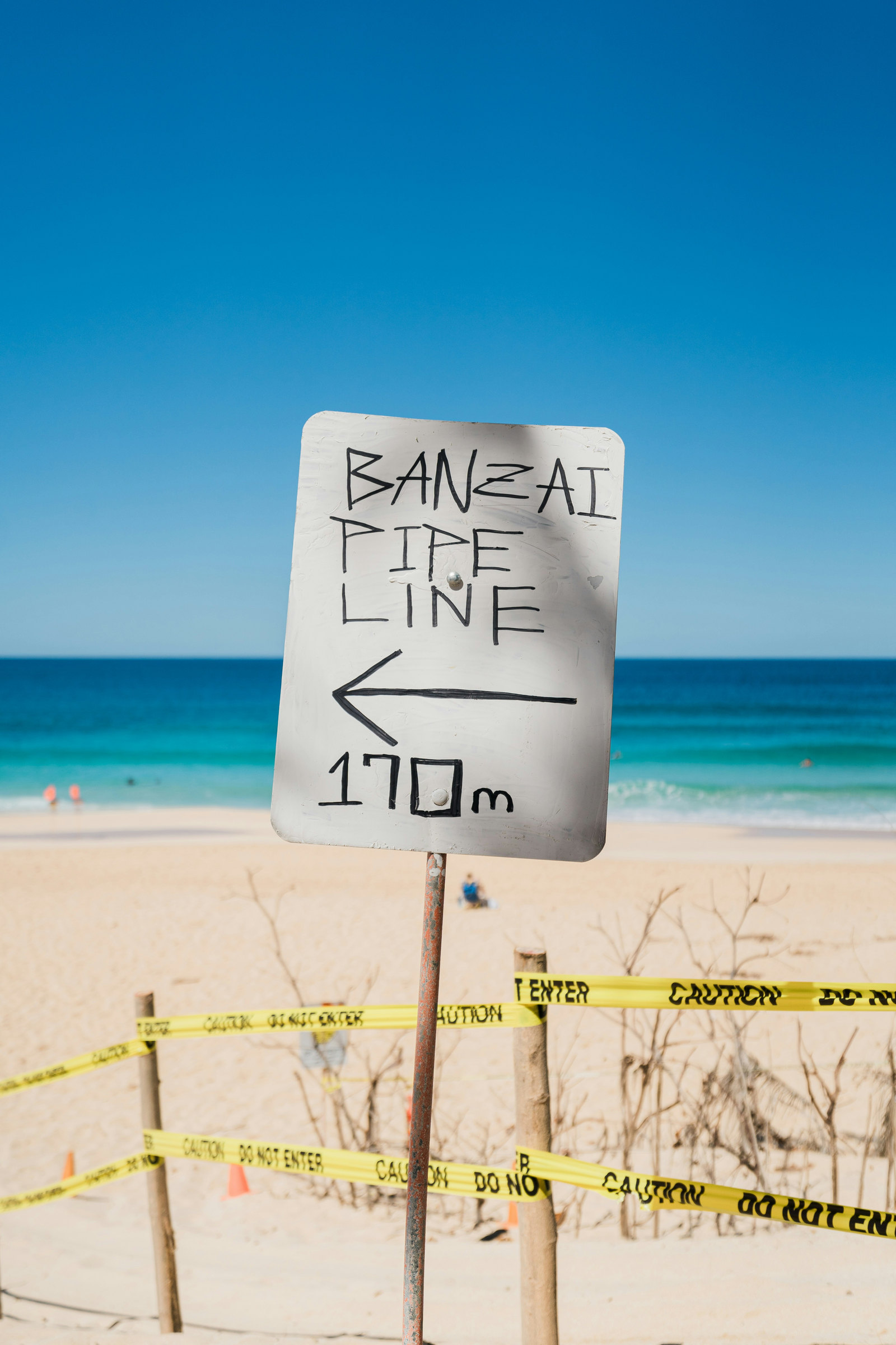 Banzai Pipeline sign and temporary safety tape